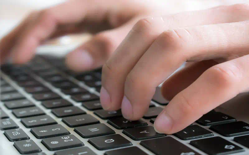 Laptop showing website design for fractional executives and consultants