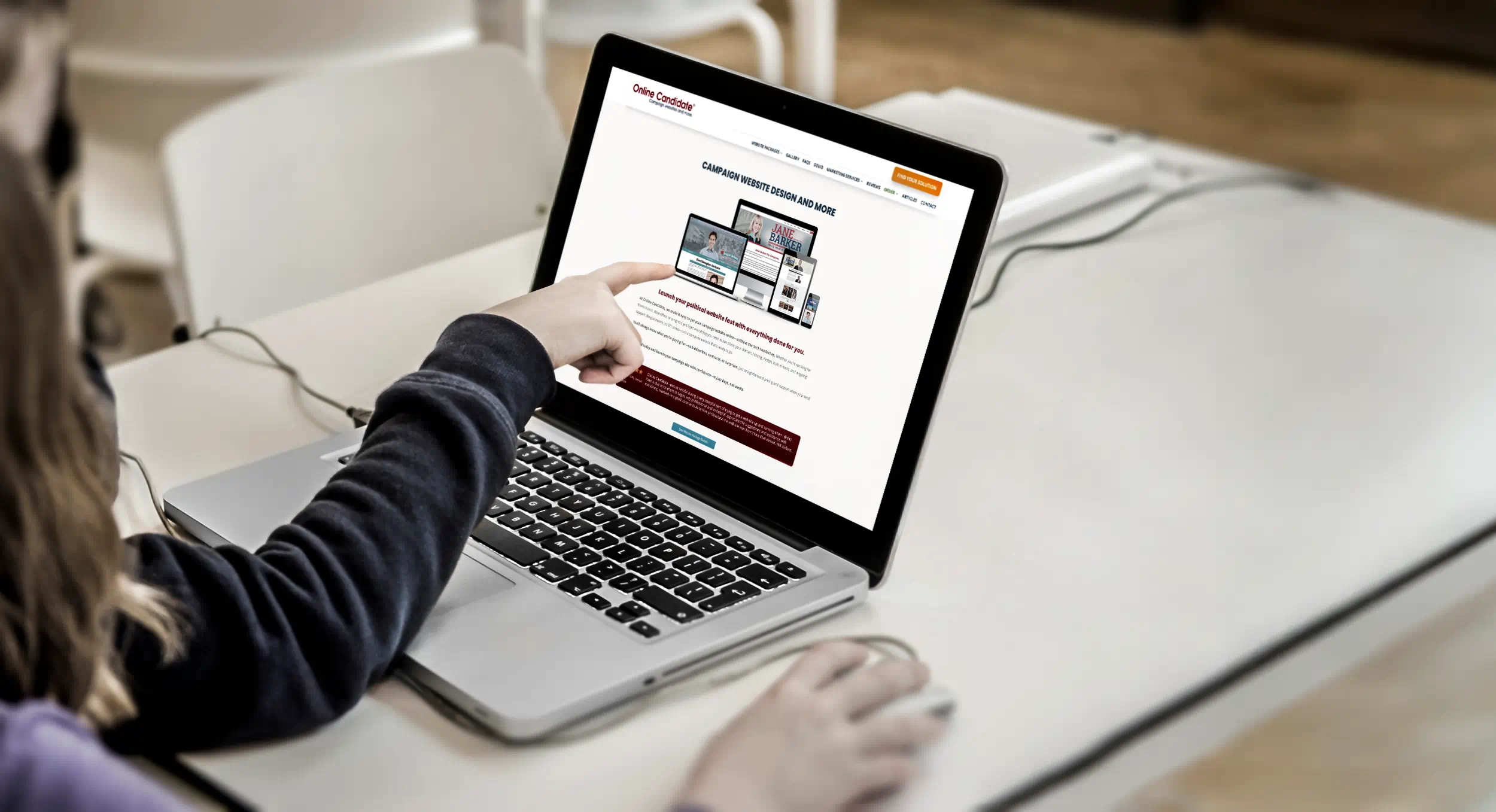 Two people looking at OnlineCandidate.com on a laptop
